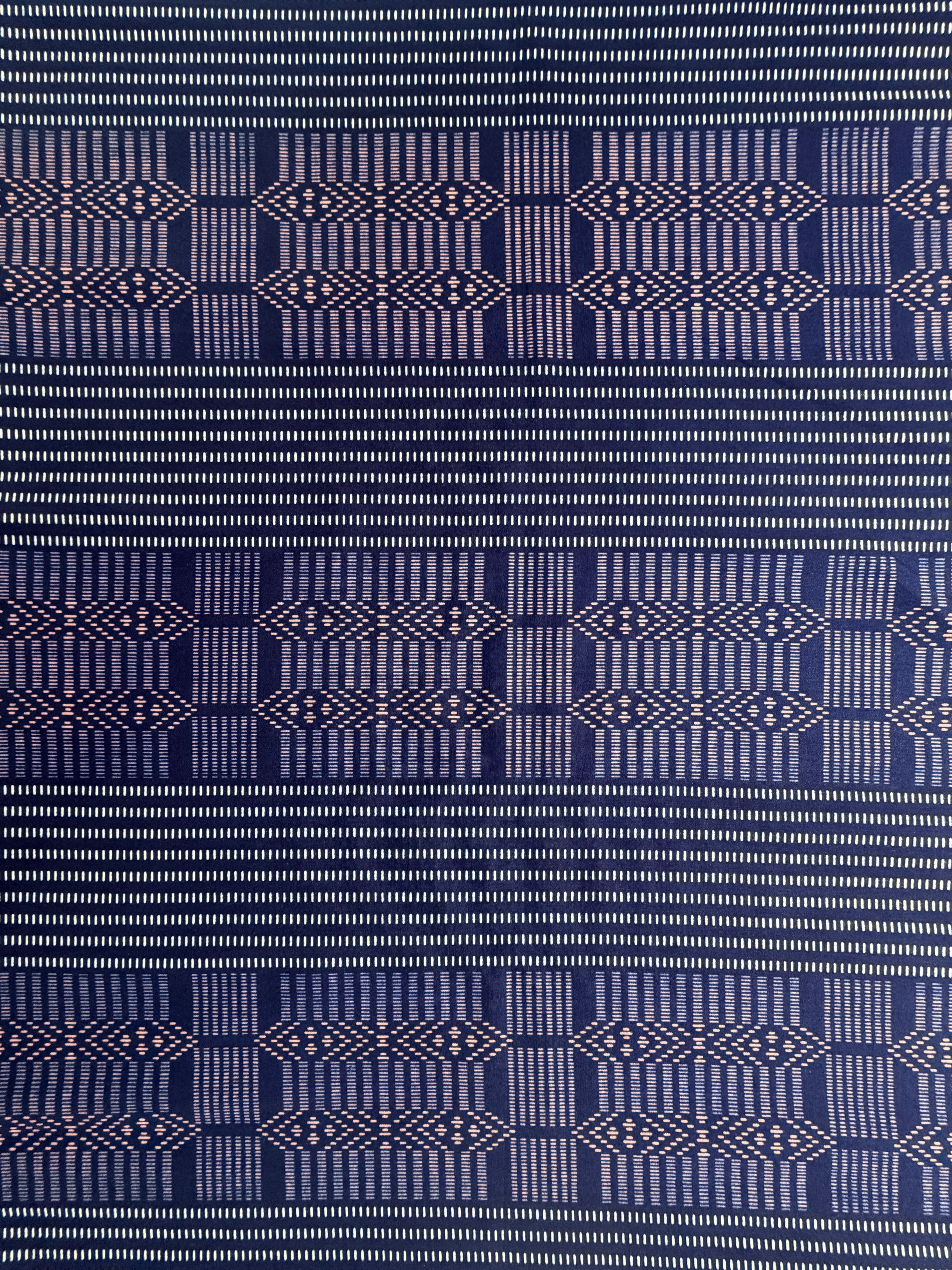 Navy blue fabric with a geometric pattern