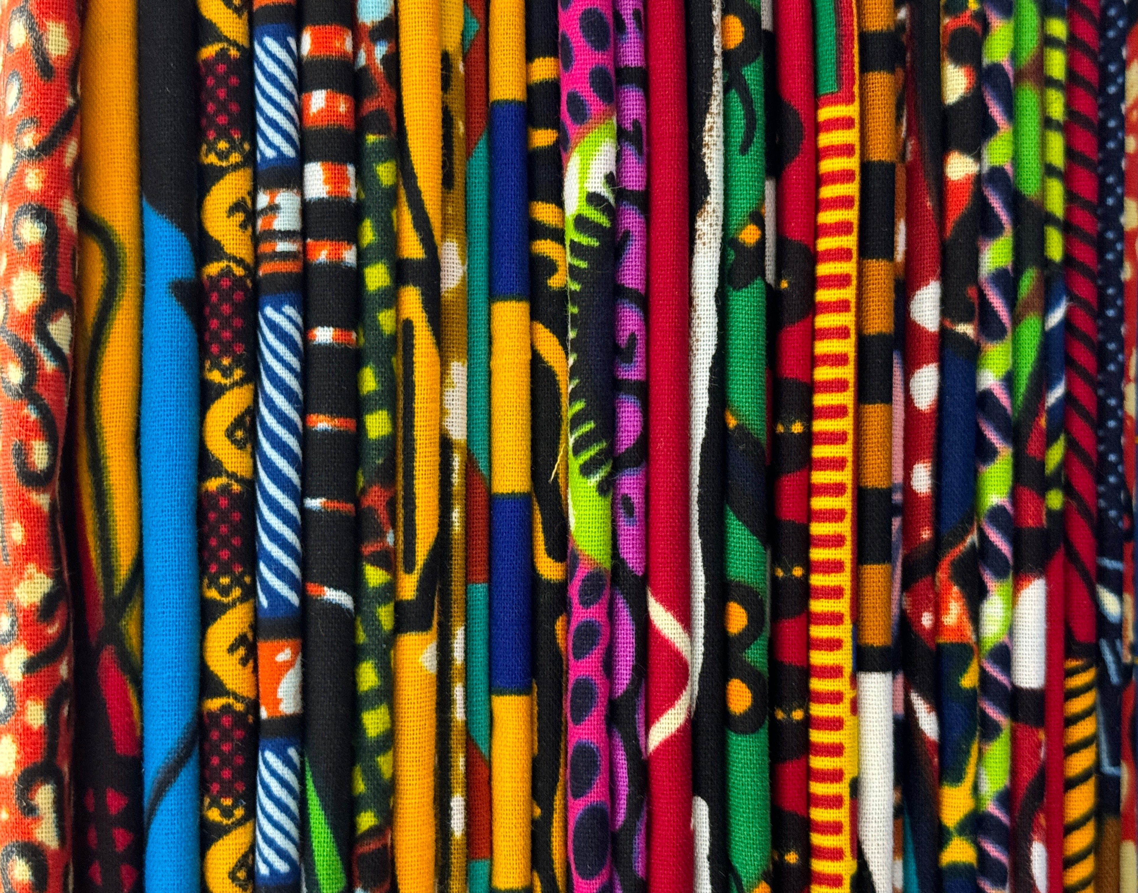 Curated selection of African fabrics in smaller craft-friendly cuts, including Ankara, Kente, and Tribal prints.