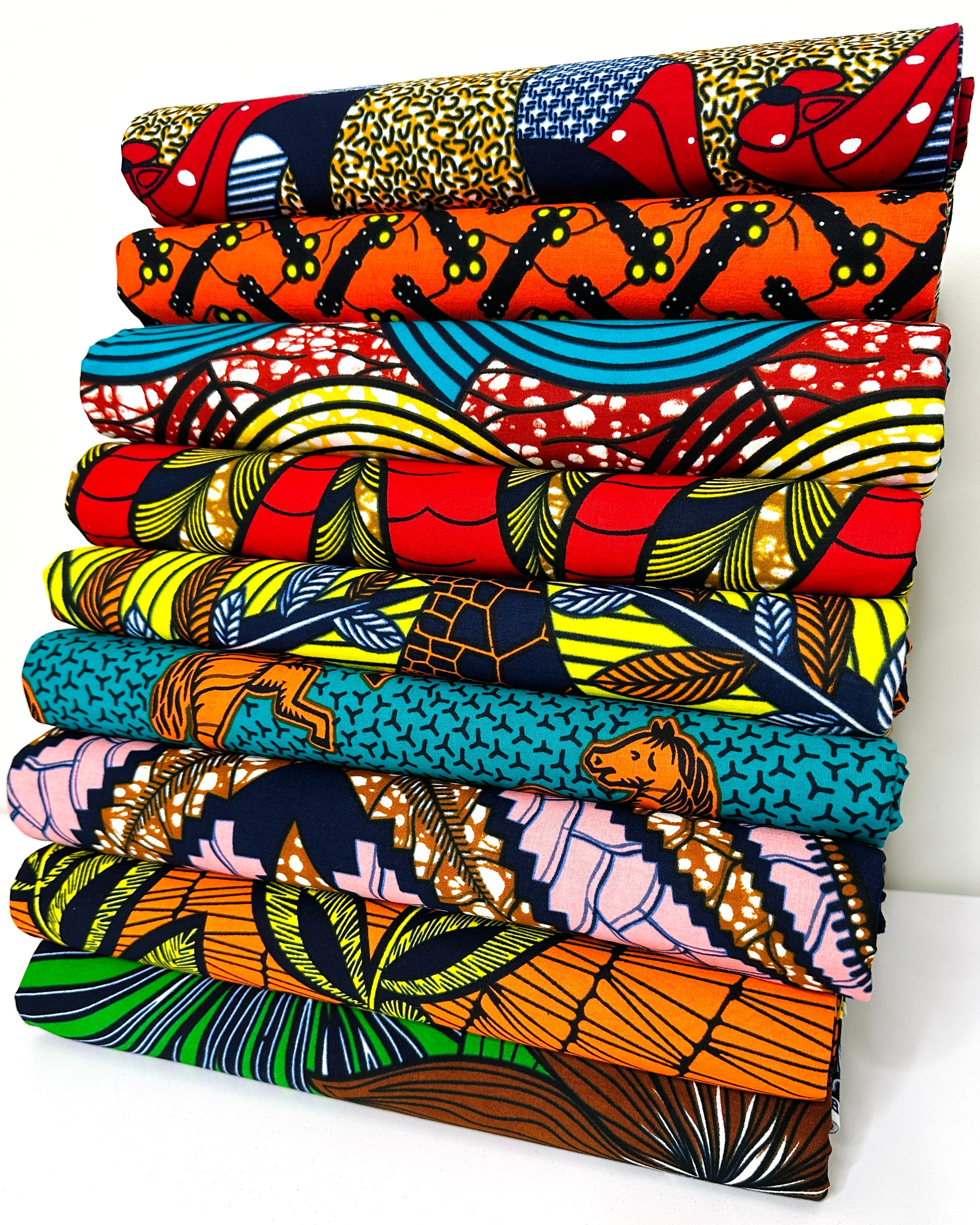 stack of african fabric ankara prints