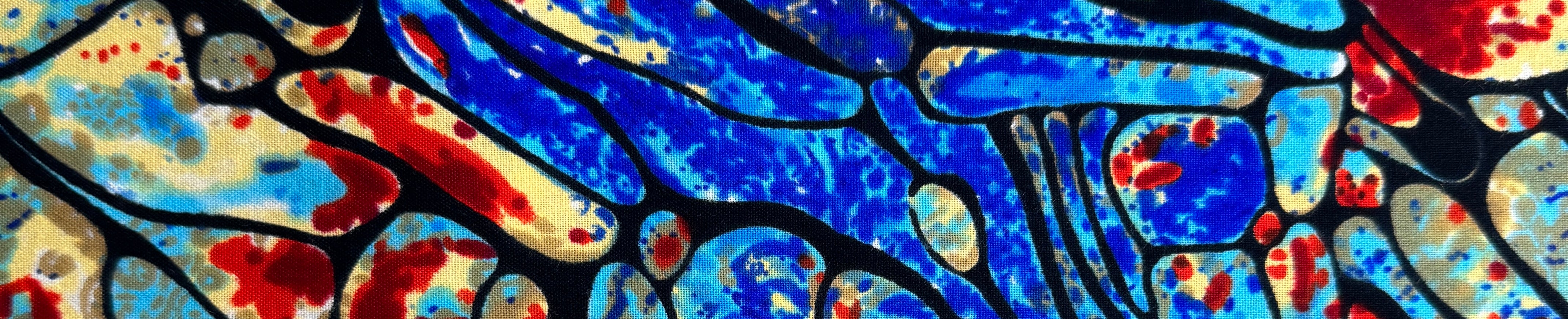 A vibrant New African Ankara fabric featuring a rhythmic, stained-glass inspired pattern in deep cobalt blue, earthy beige, and fiery red tones.